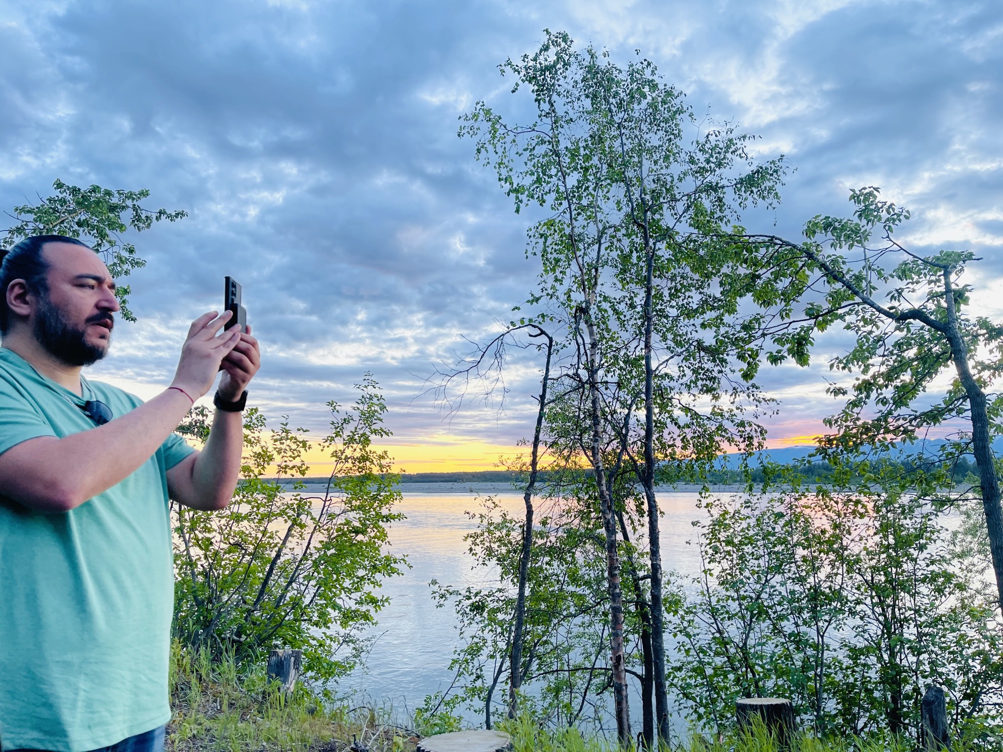 Andres Gonzalez photographing an Anchorage sunset